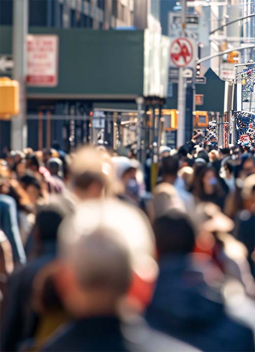 large crowd on the streets of NYC